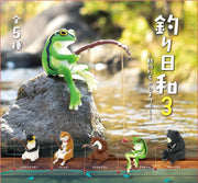 Visual display of 5 different animal figurines sitting and fishing. Animals are: penguin, dog, otter, frog and bear.