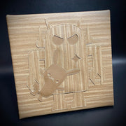 Square canvas covered in wood grain pleather fabric, with a Big Boss Robot holding a small rabbit under its arm in the center of the piece. The robot is the same wood grain pattern, though in a different direction so it is slightly more visible.