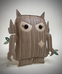 Vinyl art plush of a semi flat doll - a chibi version of a Big Boss Robot with wood like fabric. It has cute angry eyes and small leaves growing off of its arms.