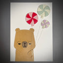 Vinyl fabric art on paper of an unimpressed capybara holding a bunch of pinwheel design round candy balloons.