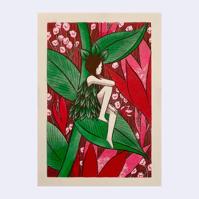 Risograph print of a girl dressed in a leaf dress sitting on a plant with red flowers behind her.