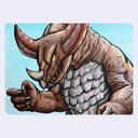 artowrk featuring a detailed illustration of a monster with brown and pink skin, horns, and a textured gray chest, set against a light blue background with a white border.