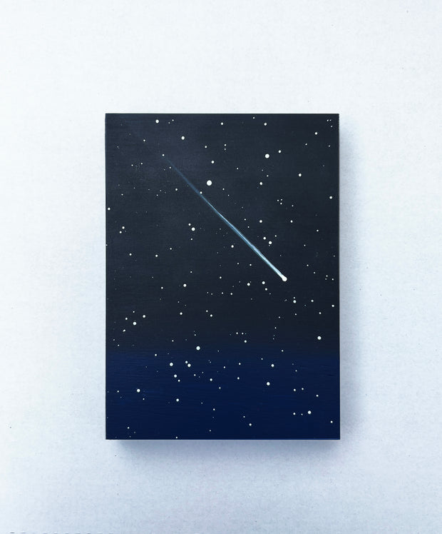 Painting of a starry night sky with a comet trail