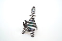 Zebra figurine on a white background