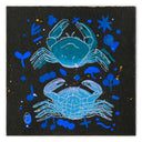 Illustration of two blue crabs on a black background with blue and yellow accents.