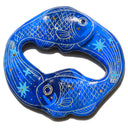 Sculpture modeled similar to an ouroboros, made of 2 fish with gold specks and star detailing.