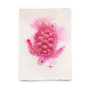 A watercolor painting of a pink sea turtle on textured white paper with torn edges, shown against a clean white background.