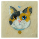 Painting on exposed wooden panel of a calico cat's head, floating and wearing a blue collar with a small gold bell. It has one blue eye and one brown eye, and looks upward at a tiny blue fish.