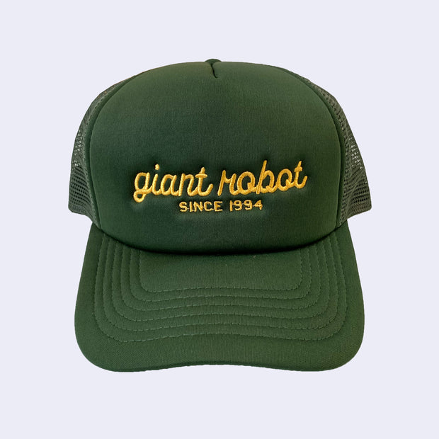 Dark green colored hat with "giant robot" written along the front in yellow cursive, and "since 1994" written below in plain capital font.