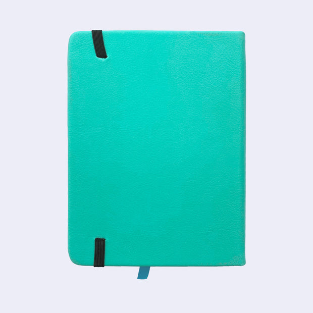 Backside of a turquoise pleather covered journal with an elastic closure and a shiny blue page marking ribbon.