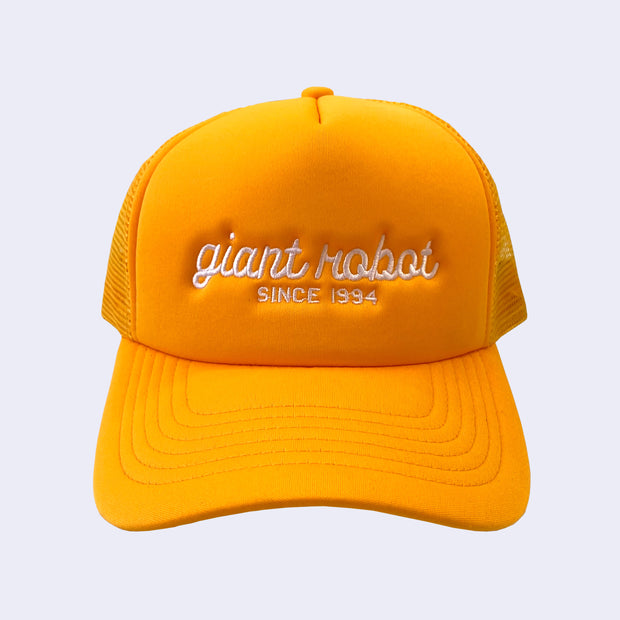 Golden rod colored hat with "giant robot" written along the front in cursive, and "since 1994" written below in plain capital font.