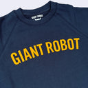 Navy blue sweatshirt with 'GIANT ROBOT' text in yellow on a light gray background