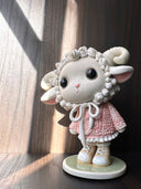 Ceramic figurine of a cute anthropomorphic sheep, with large shiny eyes and curled horns. She wears a pink textured sweater and tennis shoes.