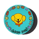 A round canvas with a yellow cartoon dog face with its tongue out on a turquoise background, surrounded by small pet-themed motifs like bones, balls, and paw prints, with the text 'Good dog!' at the bottom.