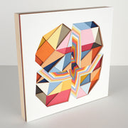 Geometric designed layered cut paper sculpture, creating a three dimensionality. A vertical and horizontal cross section of a 10 sided shape reveals many layers. Colors are earthy toned browns, oranges, yellows, blues and reds. Shown at the side.