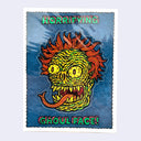 Die cut sticker on a sheet of a ghoul face with no nose, wild orange hair and a forked tongue.