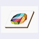 Assembling of cut paper, layered atop one another to reveal a series of geometric shapes contained within a larger 11 sided shape. Inner shapes are multiple colors and the layer thickness can be seen at the side.