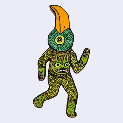 Illustration made with many lines, giving it the feel of a folk art woodcut on a die cut wood panel of a bird with a very large orange beak and a person's body, wearing green and orange knit clothing.