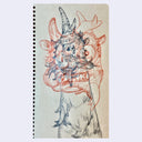 Notebook with a fantasy creature illustrations super imposed atop of one another.