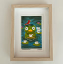 Painting of a green Kappa turtle character with large cartoon eyes and a wide smile. It holds a cup of cappuccino with more cups sitting on lily pads nearby. 