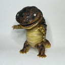 Toy salamander figure on a white background