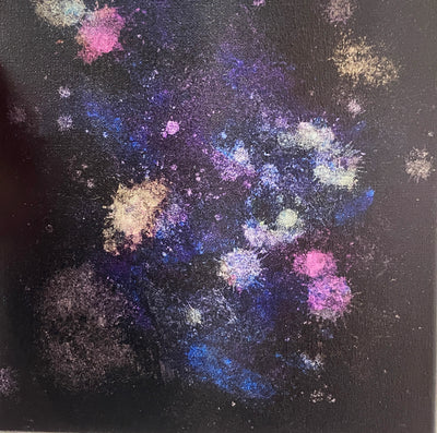 A nebula on canvas, it looks a bit like paint splatter too.