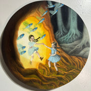 Illustration on round panel of a large tree trunk, with a glowing portal like opening. Out of it comes a girl with braids, holding hands with a mirror image of herself outside the tree. Several flying fish come out of the portal as well.