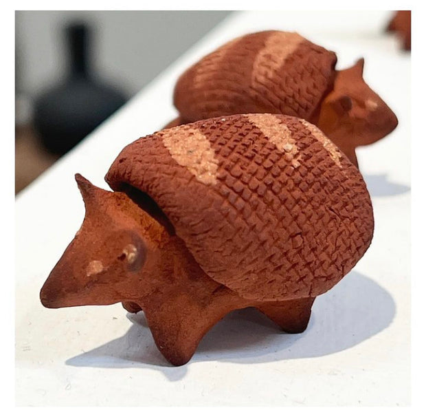 Small ceramic armadillos, earthtone.
