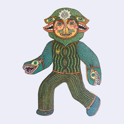 Die cut wooden sculpture of a monster wearing all knit clothing, with small monsters as hand mittens. Its face has a small pair of twins blowing a pink bubblegum bubble as eyes.