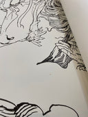 Detail shot of a single off colored speckle in the middle of the drawing.