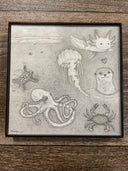Graphite drawing of many cartoonish underwater creatures, such as: octopus, turtle, jellyfish, axolotl, otter and crab.