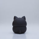 Black clay pot with a lid that looks like a fox's head, a matching black color with red ears and face paint. It has closed eyes and a small white nose. The bowl has no body details.