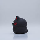 Black clay pot with a lid that looks like a fox's head, a matching black color with red ears and face paint. It has closed eyes and a small white nose. The bowl has no body details.