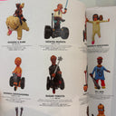 Open book page from Dehara's 1998-2018 works featuring several catalogue style images of his sculptures.