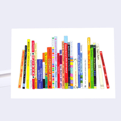 White greeting card with an illustration of lined up books, featuring many classic Children's books such as: Goodnight Moon, The Giving Tree, The Snowy Day, etc.
