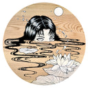 Illustration on a circular wood panel of a woman, half submerged in water with wisps of hair floating atop the water. Lily pads and flowers float atop.