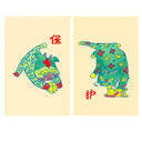 Set of 2 risograph prints on cream colored paper of stylistic Lion Dogs, playing with a ball in one and a plush animal in the other.