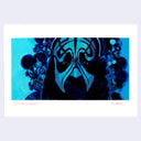 Close-up of a stylized mask with blue and black colors on a white background
