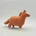 Matte surfaced ceramic sculpture of a horse, chubby and brown with a white stripe on its face and white hooves.
