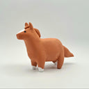Matte surfaced ceramic sculpture of a horse, chubby and brown with a white stripe on its face and white hooves.