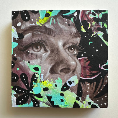 Artistic depiction of a face with colorful abstract elements on a white background