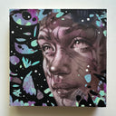 Artistic portrait with abstract patterns on a black background