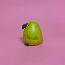 Small ceramic figure of a rounded, chubby green bird with a vase opening at the top of its head.