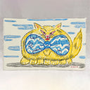 A square hand-drawn illustration of a yellow cat with closed eyes wearing a large blue bow tie, set against a white background with blue clouds. Signed 'SCALZO' in the bottom right corner.