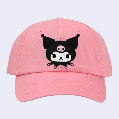 Pink soft cotton hat with a slightly curved bill and an embroidered graphic of Kuromi's head on the front center.