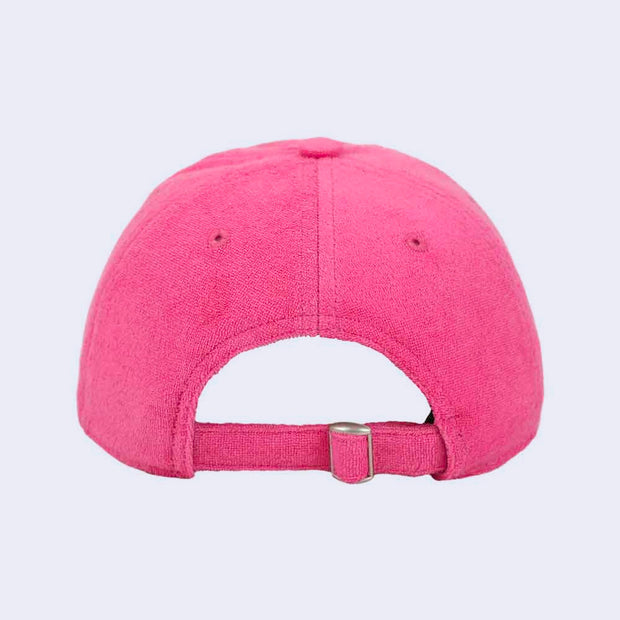 Back view of pink terry cloth hat, with buckle adjustment.