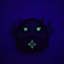 Glowing green face on a dark blue background