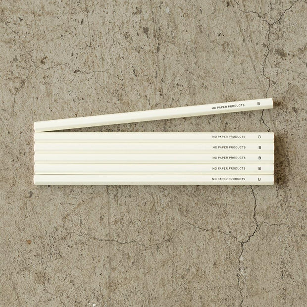 Pack of 6 pencils with an off white body. All have "MD Paper Products / B"