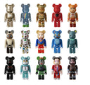 A 3x5 grid of Bearbrick collectible figures on a plain white background, each figure showing a different character design and color scheme.