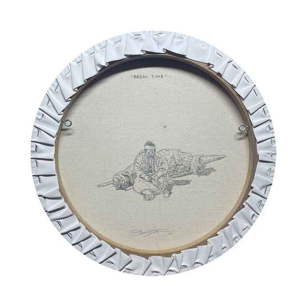 Back view of a circular canvas painting, featuring a line art style drawing of a man sitting on the ground with a knife next to a slain Godzilla.